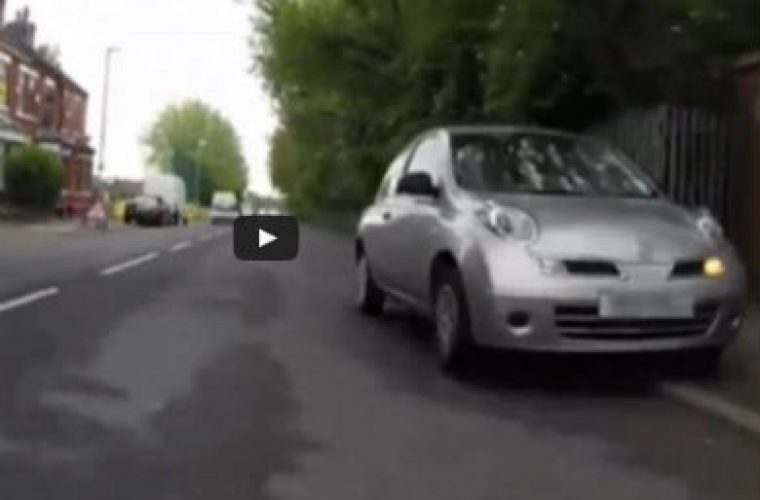 Video: Crazy driver undertakes motorcyclist by mounting pavement