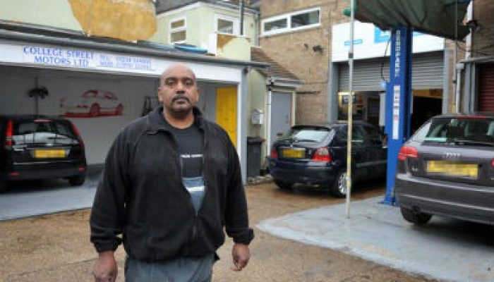 Garage owner fights council’s order to remove ramp