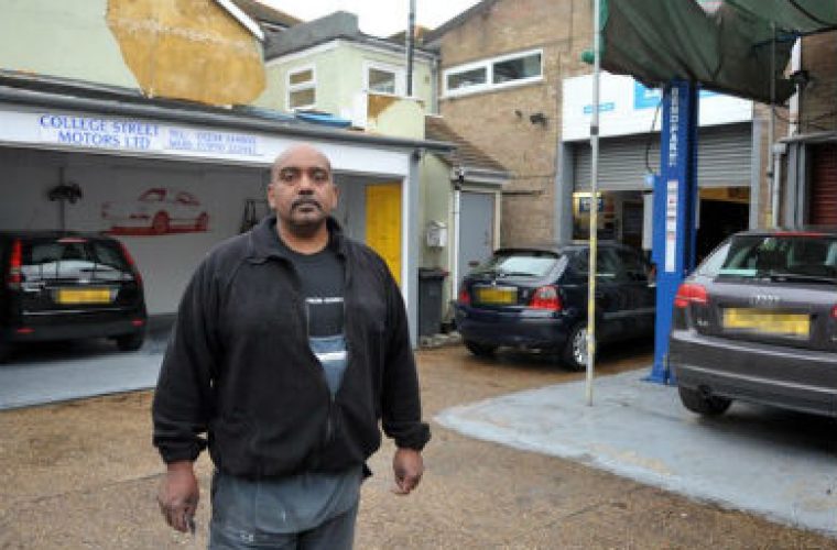 Garage owner fights council’s order to remove ramp