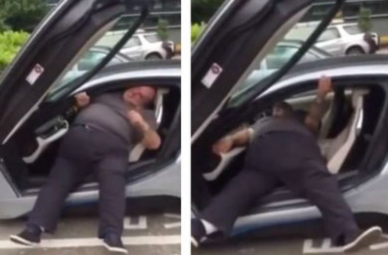 Video: laughter all round as man tries to exit £100k BMW