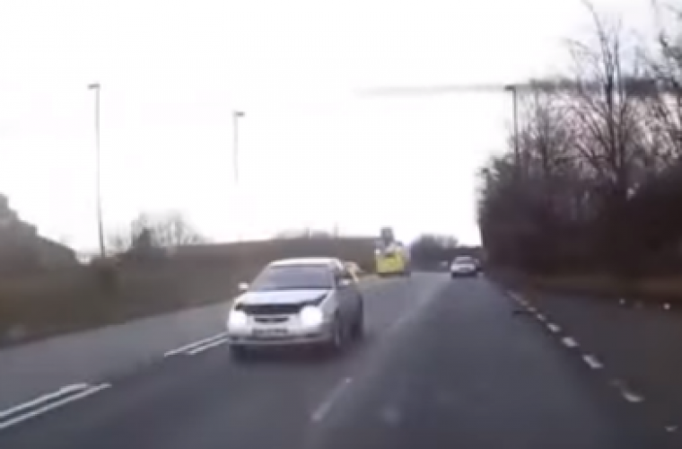 Watch: car bonnet is ripped off vehicle on busy Newcastle road