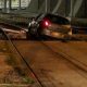 Oblivious motorist drives on tram tracks and gets stuck at station