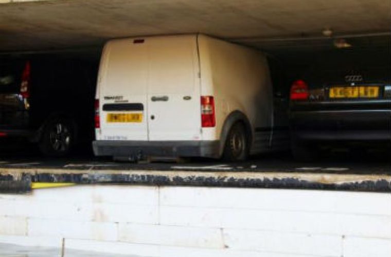 Cars crushed in London carpark as insulation soaks up floodwater