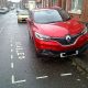 Driver fined for painting blue badge parking bay outside home