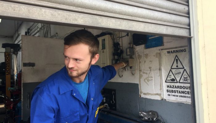 Uninsured driver’s van gets stuck under shutters at tyre depot