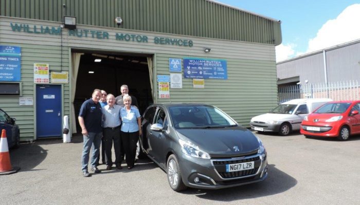 AutoCare garage presents customer with brand new Peugeot 208