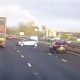 Terrifying moment HGV clips car and sends it spinning across four lanes