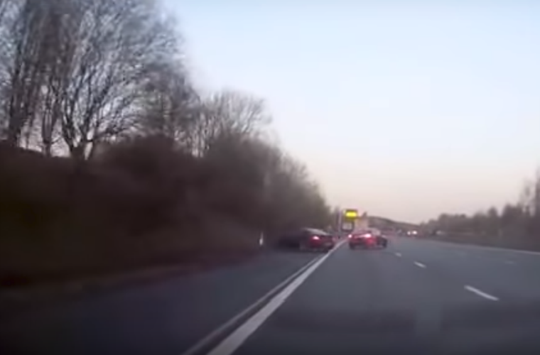 Watch: Shocking moment car veers off M4 and flips after avoiding out-of-control Jag