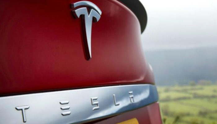 Tesla reports record £523M loss