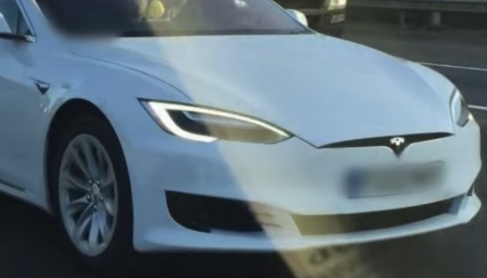 Tesla driver gets banned after getting caught in passenger seat with autopilot engaged