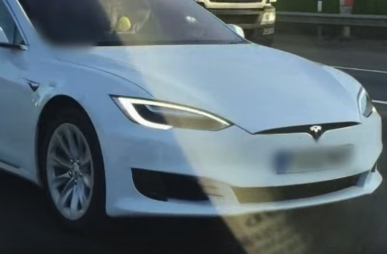 Tesla driver gets banned after getting caught in passenger seat with autopilot engaged