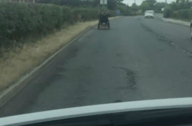 Video: Motorist catches wheelchair user doing 40mph