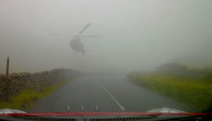 Watch: SAS helicopter swoops down through fog narrowly missing motorists