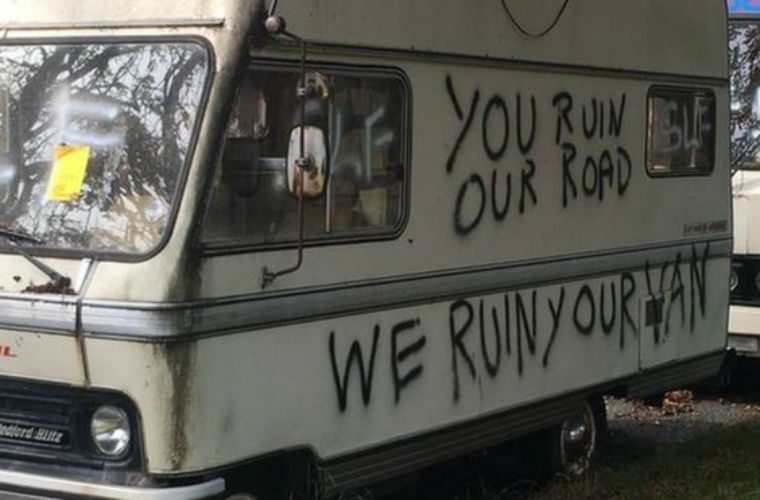 Legally parked vans told to “go away” in graffiti messages