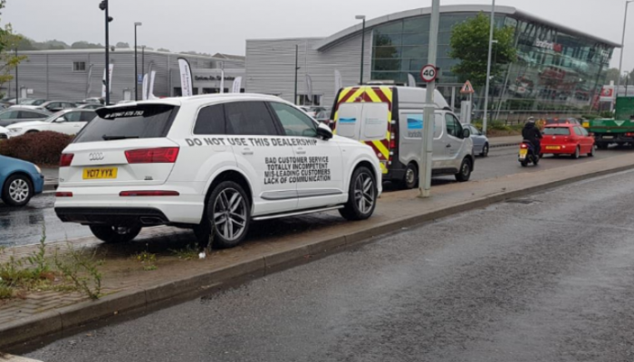 Audi Q7 owner covers car with complaints in protest of sister-in-law’s A6 repair quote