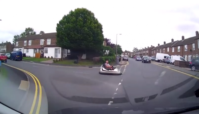 Watch: Man spotted driving fairground bumper car down public road