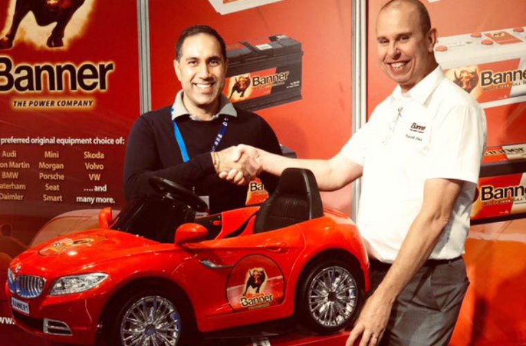 Two Banner winners drive off with kids’ electric car at AAG trade show