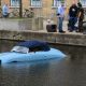 Porsche 356 replica gets knocked into canal by passing van