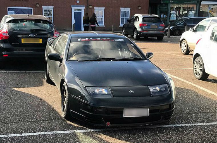 Driver defends taking up two spaces and insists he pays for two tickets