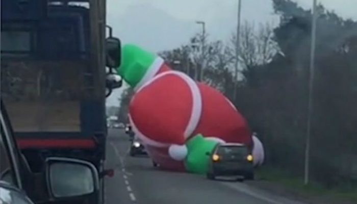 Watch: Chaos as giant inflatable Santa blocks Cambridgeshire road
