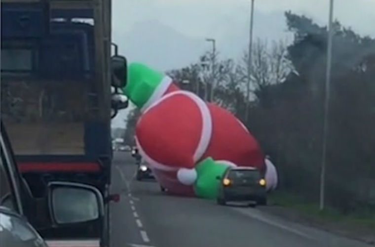 Watch: Chaos as giant inflatable Santa blocks Cambridgeshire road