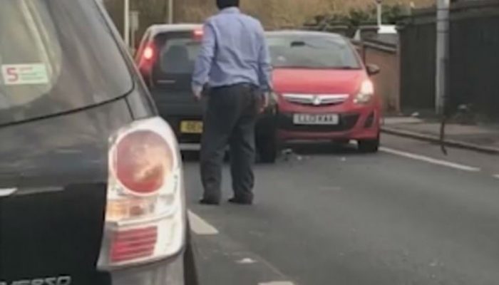 Watch: Driver floors man in road rage brawl before speeding off and crashing