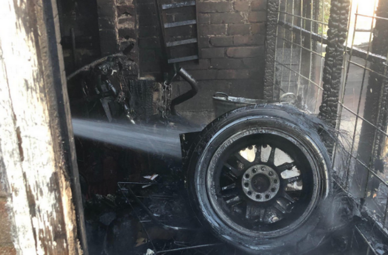 Fire caused by accidental ignition destroys much of garage