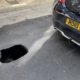 Driver shock as Volvo C30 became trapped in four-foot-deep pothole