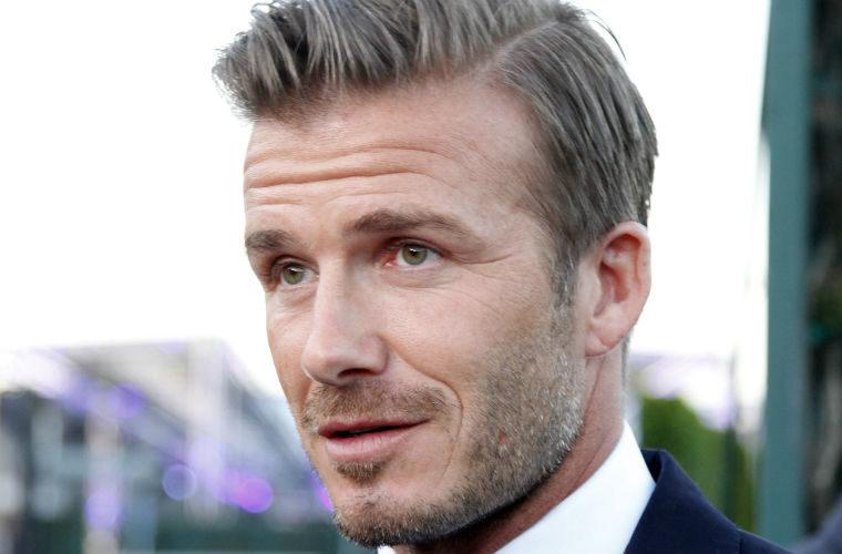 David Beckham banned from driving after using phone behind the wheel