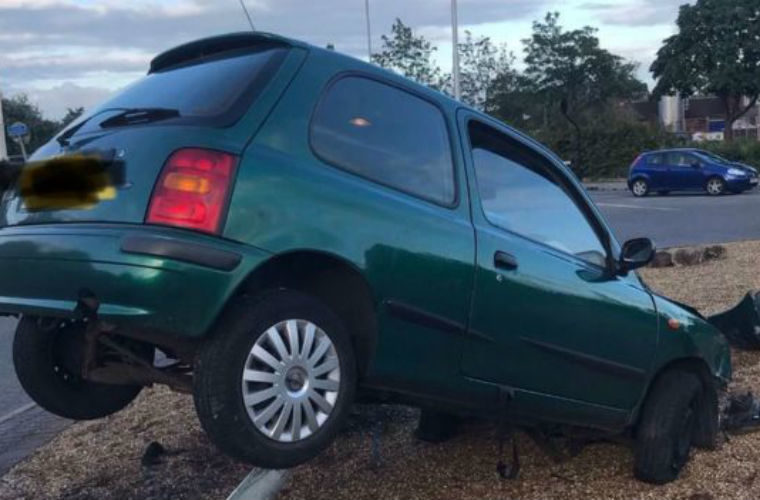 Police fed up with drivers taking photos of impaled car