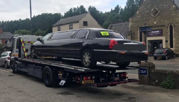 Police seize limo taxi with expired MOT and give occupants lift to Grand Prix