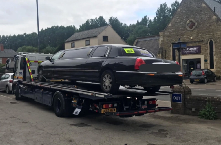 Police seize limo taxi with expired MOT and give occupants lift to Grand Prix