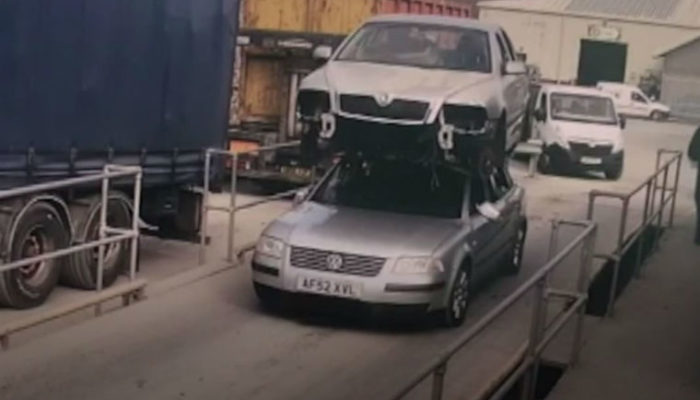 Video: Man fined for driving car with another car on its roof