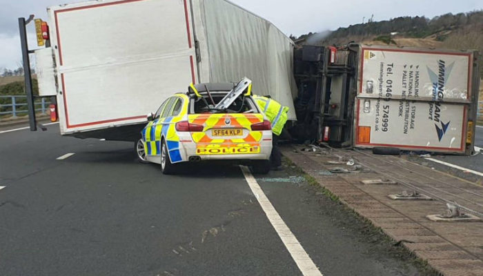 Watch: Lorry crushes police car in high winds