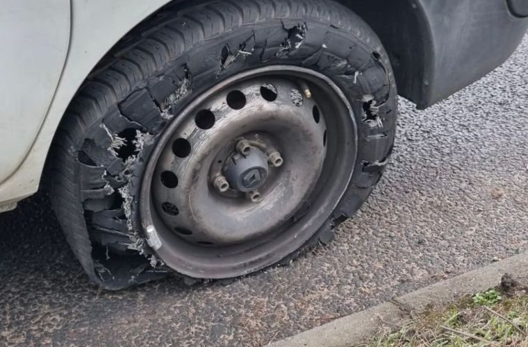 Police stop van with shredded tyre