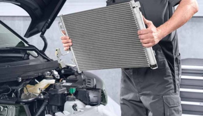 Different screw plug needed for BMW radiator installation depending on model, technicians warned