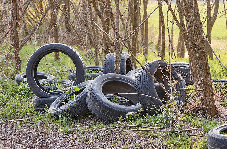 Garage praised for removing fly-tipped tyres from beauty spot